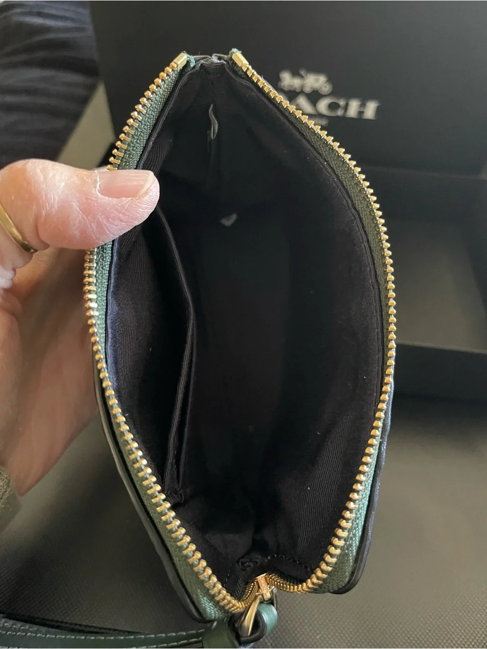 NWT Coach Corner Zip Signature Embossed Wristlet